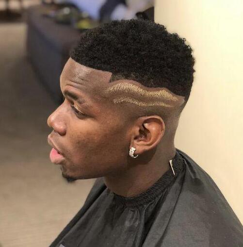 Gwiazda Manchester United Paul Pogba dostaje kolejną nową fryzurę, aby uczcić zwycięstwo Chelsea